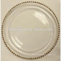 glass plates with gold or silver balls in the border